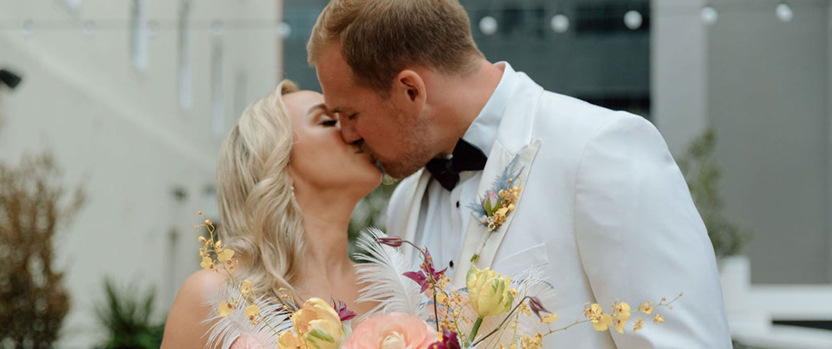 newlyweds kissing